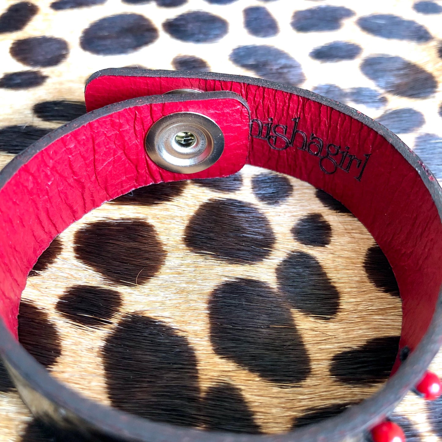 Black Snakeskin Bracelet with Red Beads
