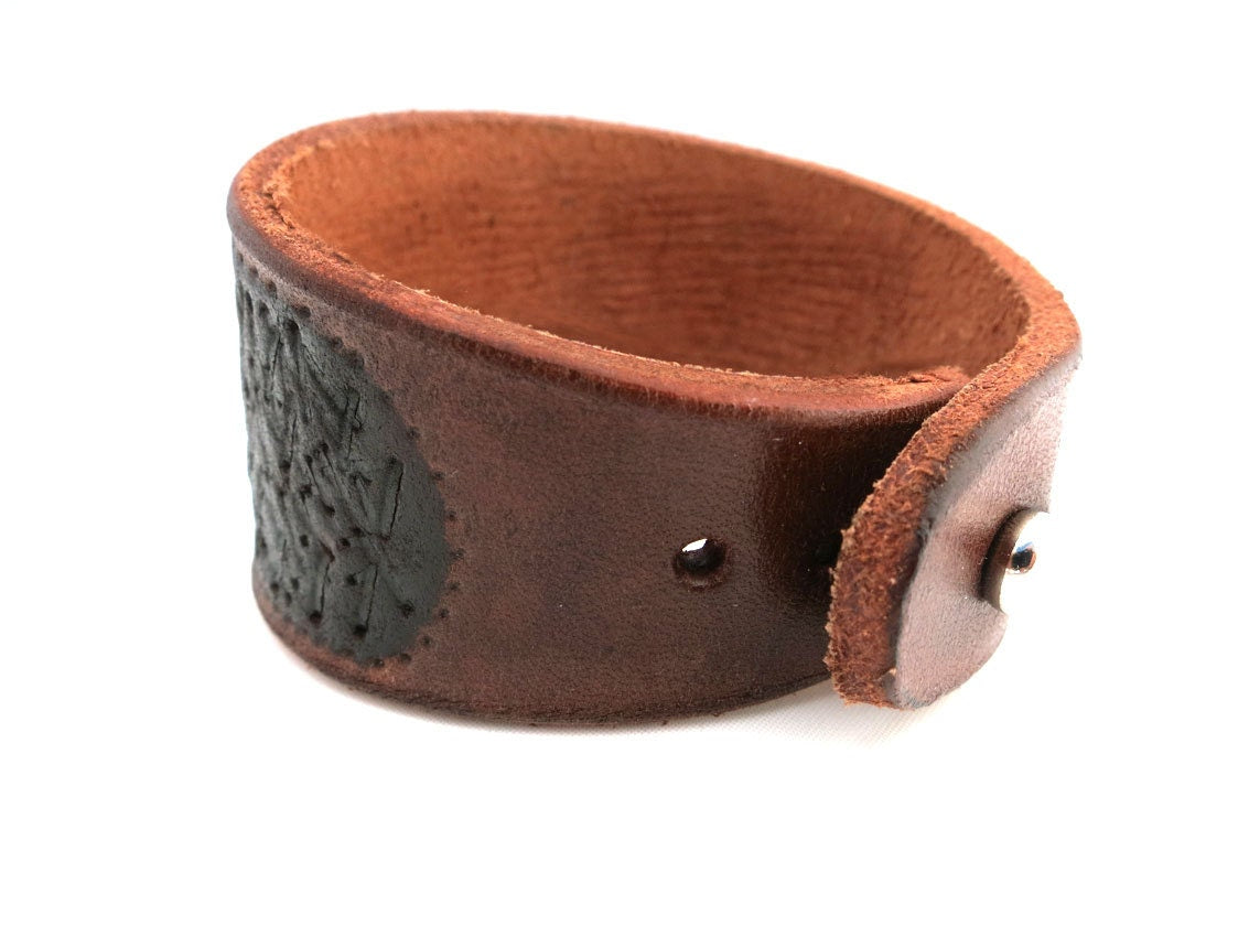 Hand Embossed Black and Brown Rawhide Unisex Cuff