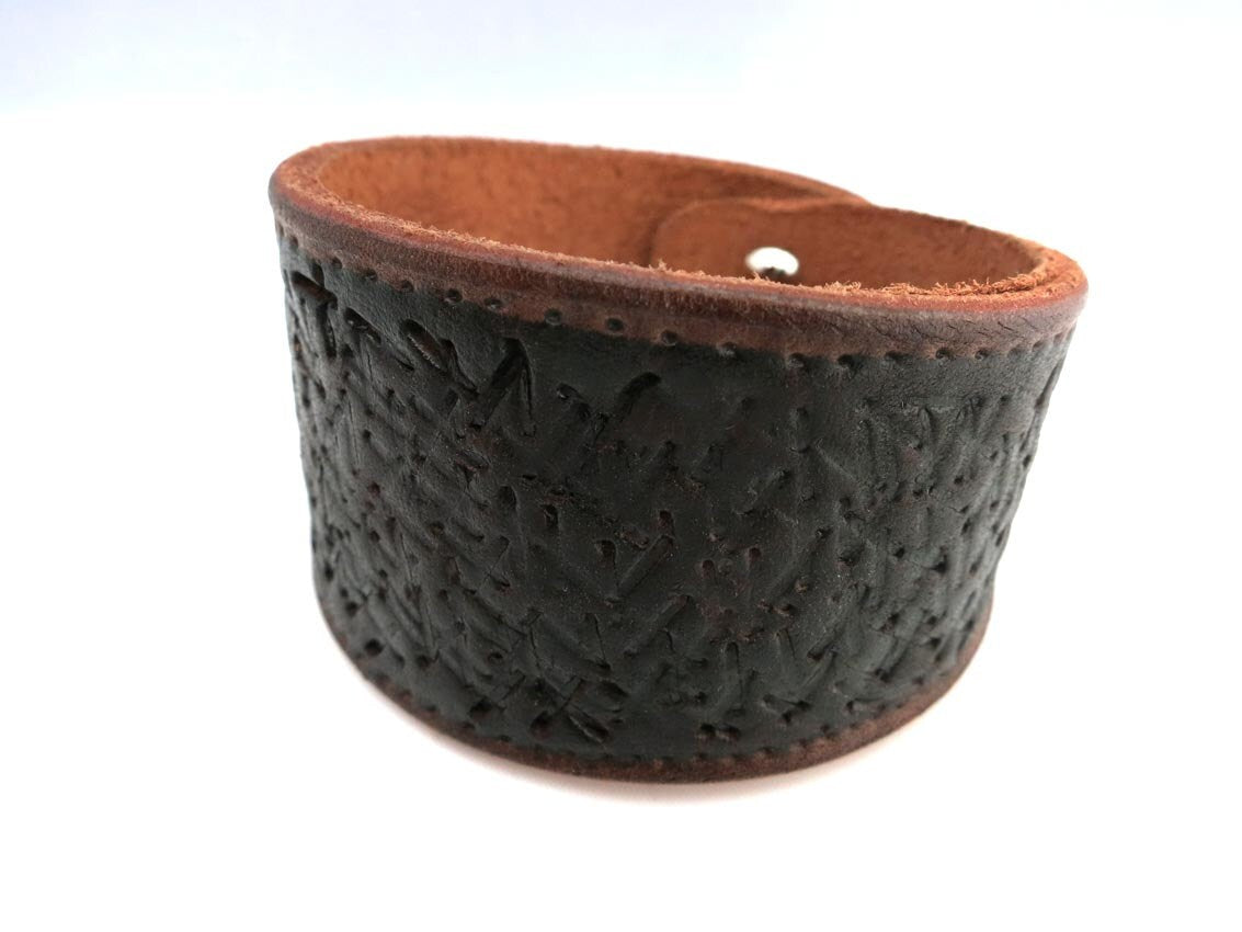 Hand Embossed Black and Brown Rawhide Unisex Cuff